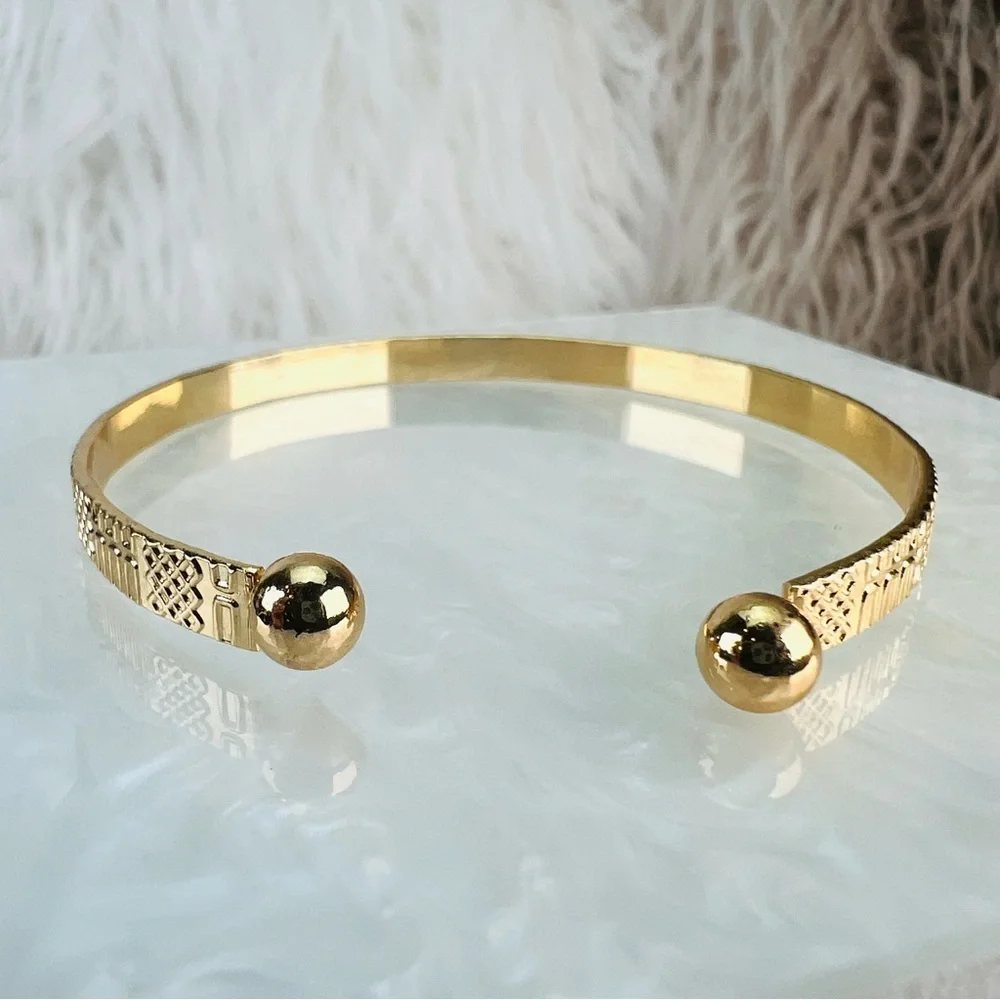 Elegant Goldtone Textured Bangle Bracelet